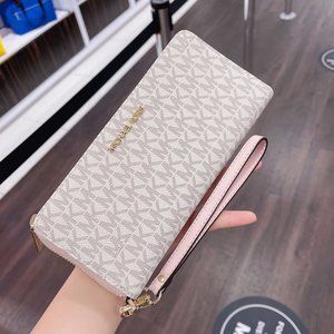 MK JS LG TRAVEL CONTINENTAL WALLET VANILLA BLUSH
